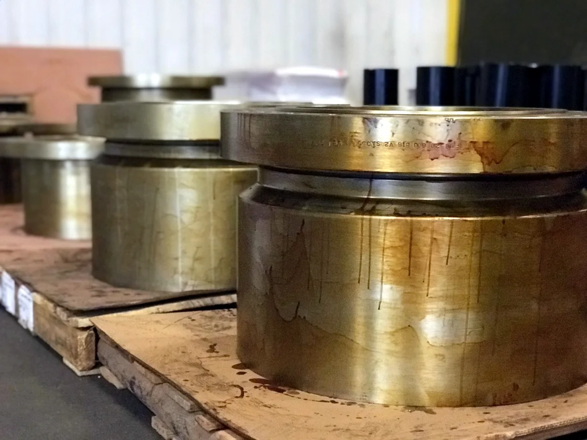 Forged pressure connectors staged on pallets for shipment planning